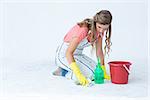 Hipster woman cleaning the ground on white background