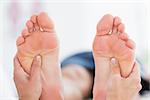 Man having feet massage in medical office