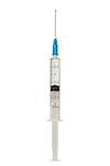 Disposable syringe with drop on needle isolated on white with clipping path