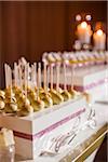 Close-up of White Chocolate Lollipops on Dessert Table