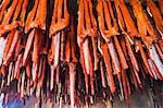 Strips Of Sockeye Salmon Hanging In A Large Smoker For Drying And Smoking; Igiugig Bristol Bay Alaska United States Of America