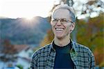 Portrait of smiling senior man in garden