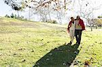 Husband and wife taking walk, Hahn Park, Los Angeles, California, USA