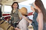 Tour guide with tourists beside plane, Wellington, Western Cape, South Africa