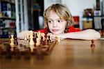 A boy playing chess