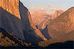 Golden evening sunshine illuminates El Capitan and Half Dome in Yosemite Valley, Yosemite National Park, UNESCO World Heritage Site, California, United States of America, North America