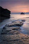 Sunset over Gull Rock from Trebarwith Strand, Cornwall, England, United Kingdom, Europe