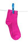 One pink sock hanging on the clothesline. Image isolated on white background