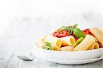 Pasta with Tomato Sauce and Basil. Italian food. Mediterranean cuisine