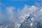 mountain peak in winter clouds, Bavaria, Germany