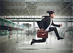 Businessman runs in the airport because late