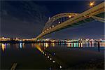 Fremont Bridge Over Willamette River in Portland Oregon Industrial Area at Night