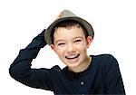 Happy boy clothing a hat with hand on his head on white background