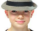 Close-up portrait on boy clothing a hat with shadow on his eyes, on white background