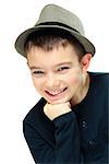 Portrait of eleven years old boy clothing a hat on white background
