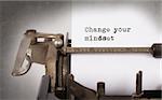 Vintage inscription made by old typewriter, Change your mindset