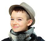 Portrait of eleven years boy clothing a hat on white background