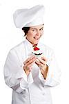 Chef holding a delicious cheesecake tart.  Isolated on white.