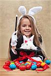 Conjuring the easter rabbit - young magician perform a seasonal trick