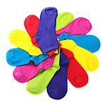 Colorful socks in shape of flower on white background