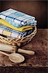 kitchen towels on a wooden table. Photographed close-up