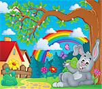 Spring theme with bunny and rainbow - eps10 vector illustration.