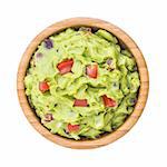 Guacamole in Wooden Bowl Isolated on White Background