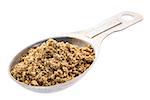 gluten free brown flax meal on a measuring aluminum tablespoon isolated with clipping paths
