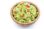 Guacamole in Wooden Bowl on White Background