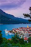 Elevated view over Korcula's picturesque Stari Grad (Old Town) illuminated at dusk, Korcula Town, Korcula, Dalmatia, Croatia, Europe