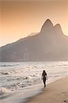 Ipanema and Leblon beach at sunset with the Morro dos Dois Irmaos (Two Brothers) hills behind, Rio de Janeiro, Brazil, South America