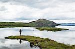 Man fishing at Thingvallavatn lake, Thingvellir (Pingvellir) National Park, UNESCO World Heritage Site, Golden Circle, Iceland, Polar Regions