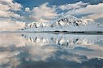 Morning light hits a mountain on the beach of Flakstad, Flakstadoya, Lofoten Islands, Arctic, Norway, Scandinavia, Europe