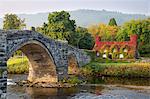 Tu Hwnt i'r Bont tearoom and Pont Fawr (Big Bridge) in autumn, Llanrwst, Snowdonia, Conwy, Wales, United Kingdom, Europe