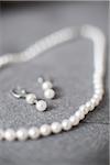 Close-up of Pearl Earrings and Necklace