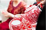 Pouring Tea for Chinese Tea Ceremony for Wedding