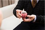 Man with Cup of Tea for Chinese Tea Ceremony for Wedding