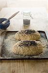 Two organic loaves of bread ready for baking