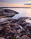Rocks on Iso Koirasaari Island at sunset, Ladoga Lake, Republic of Karelia, Russia