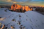 The pinnacles of the Sassolungo (Langkofel), in the red rays of the sunset, South Tyrol, Dolomites, Italy, Europe