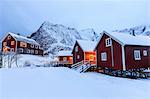 Fresh snow on the typical Norwegian homes, the Rorbu, once fishermen's home, now tourist accommodation, Lofoten Islands, Arctic, Norway, Scandinavia, Europe