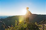 Male trail runner looking out to landscape on Pacific Crest Trail, Pine Valley, California, USA