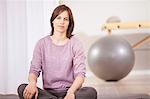 Woman taking a break on Pilates class