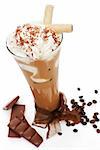 Luxurious delicious iced coffee with foam with chocolate and coffee beans isolated on white. Cool summer drink concept.