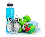 Two green dumbells, tape measure, drink bottle and alarm clock. Fitness and health. Isolated on white background