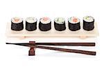 Sushi maki with salmon and cucumber. Isolated on white background