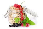 Healty breakfast with muesli and berries. Isolated on white background