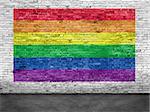 Rainbow flag painted over old white brick wall