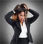 Businesswoman screaming exhausted and confused for debts