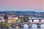 Image of Prague, capital city of Czech Republic with Charles Bridge and many other bridges crossing Vltava River.